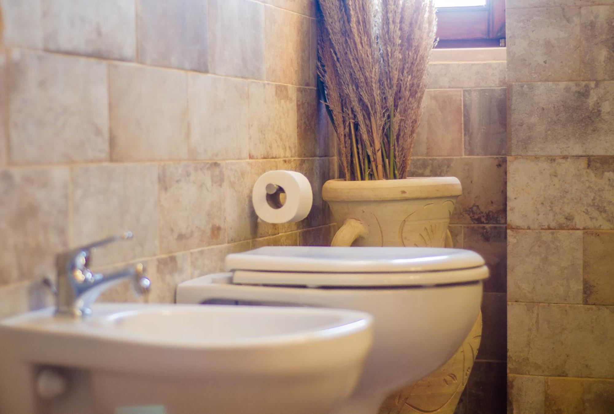 Roman Ruins - Elegant Apartment Olbia Bagian luar foto