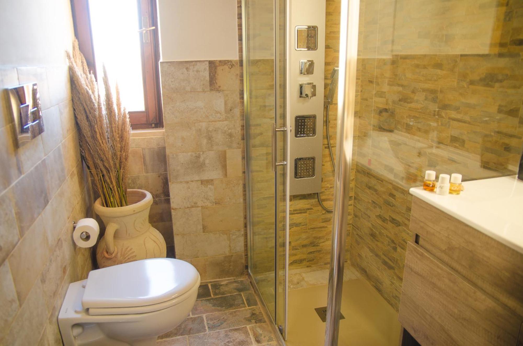 Roman Ruins - Elegant Apartment Olbia Bagian luar foto